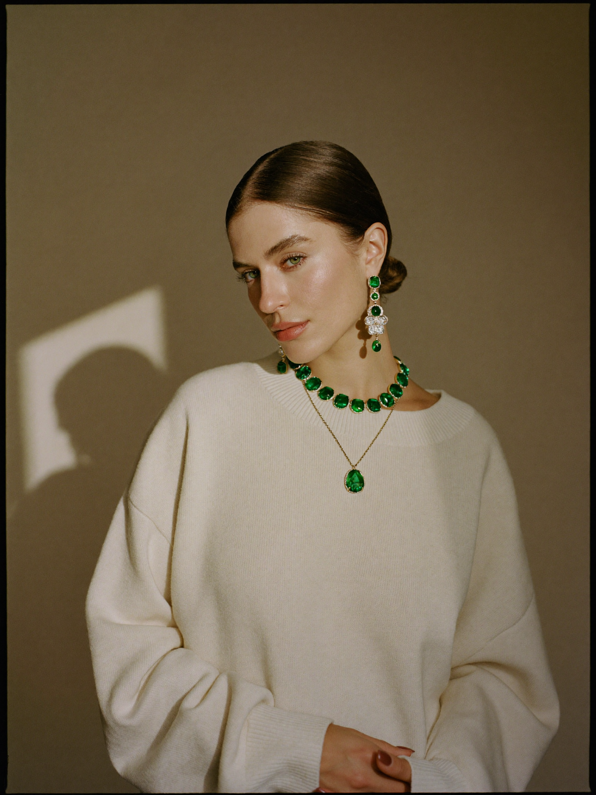 Model wearing the full emerald collection